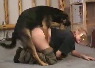 Big booty lady in khaki pants getting fucked by her dog from behind