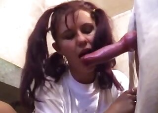 Round booty zoophile wears a t-shirt while banging a white beast