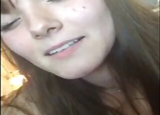 Brunette cam girl leaves her dog sniff and lick the pussy during her show