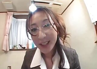 Clothed Japanese ass licks the dog in front of her master