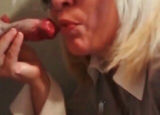 Blonde MILF sucks dog’c massive dick on cam like a real whore